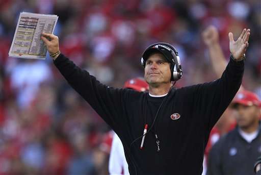 San Francisco 49ers coach Jim Harbaugh gestures
in the fourth quarter against the New York
Giants. (AP Photo/Marcio Jose Sanchez)