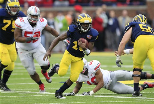 Michigan quarterback Denard Robinson. (AP 
Photo/Carlos Osorio)
