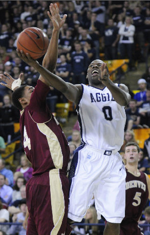 Utah State's Brockeith Pane attempts a layup 
against Denver. (Utah State)