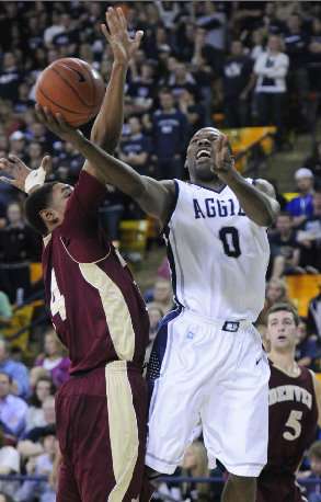 Utah State's Brockeith Pane attempts a layup
against Denver. (Utah State)