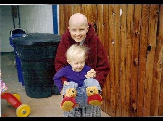 BJ holding his niece, Rebekah, after chemo treatments.
