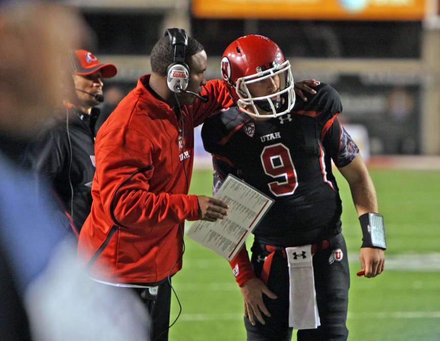 Utah quarterback coach Brian Johnson talks with Jon Hays as the University of Utah defeats Oregon State University 27-8 Saturday, Oct. 29, 2011. (Tom Smart, Deseret News)