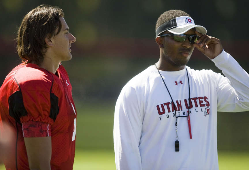 Former Utah quarterback Brian Johnson with quarterback Jordan Wynn during practice at the U of U baseball field in Salt Lake City on Tuesday, Aug. 9, 2011. (Mike Terry, Deseret News)