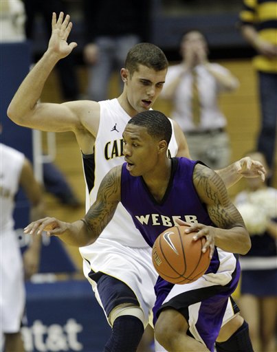 Weber State guard Damian Lillard (1) tries to 
get around California 's Harper Kamp. 
California won 77-57. (AP Photo/Marcio Jose 
Sanchez)