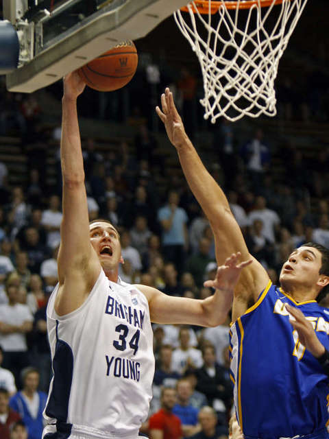 BYU's Noah Hartsock shoots past UCSB's Jaime
Serna. (Deseret News)