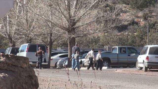 FLDS faithful could be seen entering a local elementary school, each carrying a bag that may have contained clothing. Observers say that those who pass a loyalty test may be asked to move to other locations somewhere in the US.