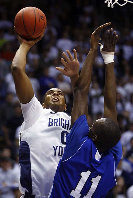 BYU center Brandon Davies scores against CS San 
Marcos (Deseret News)