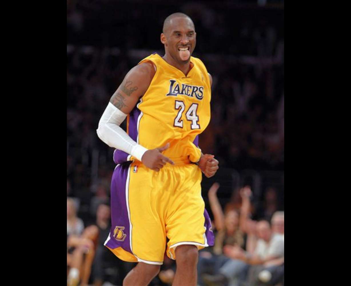 Los Angeles Lakers guard Kobe Bryant sticks out
his tongue after making a three-point shot
against the Utah Jazz. Lakers won the game 96-
71. (AP Photo/Alex Gallardo)