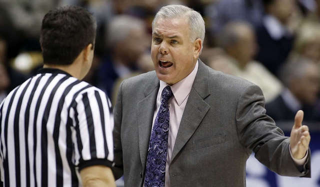 BYU head coach Dave Rose argues with a referee
(AP Photo)