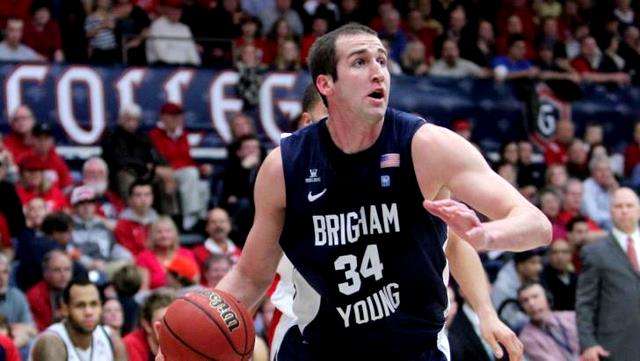 BYU's Noah Hartsock drives to the basket
against St. Mary's (Photo by Tod Fierner/Saint
Mary's)