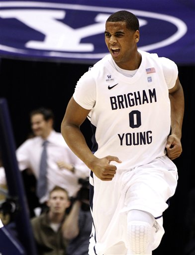 BYU forward Brandon Davies (0) reacts after a 
shot against San Diego. (AP Photo/Jim Urquhart)