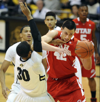 Utah's Jason Washburn tries to drive through 
Colorado's Carlon Brown (AP Photo/The Daily 
Camera, Cliff Grassmick)