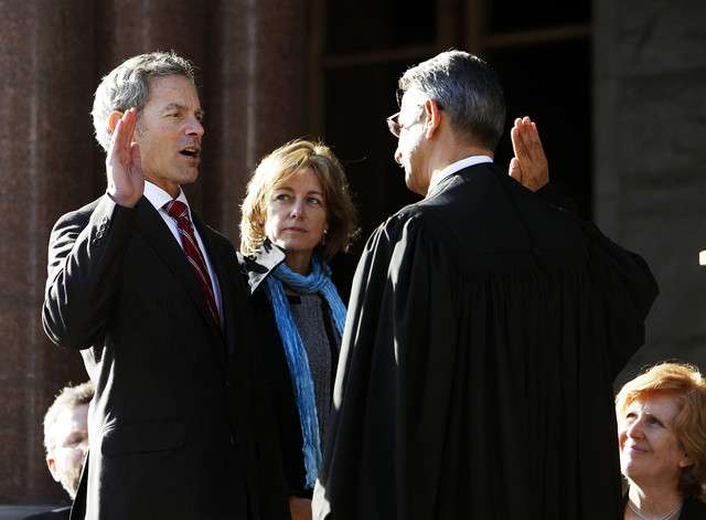 Mayor Ralph Becker is sworn in as Salt Lake City Mayor by The Honorable Andrew A. Valdez in Salt Lake City, Tuesday, Jan. 3, 2012. At back center is Kate Kopischke. (Photo: Ravell Call, Deseret News)