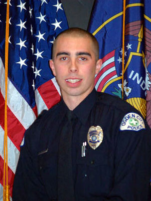 Injured officer's condition upgraded again