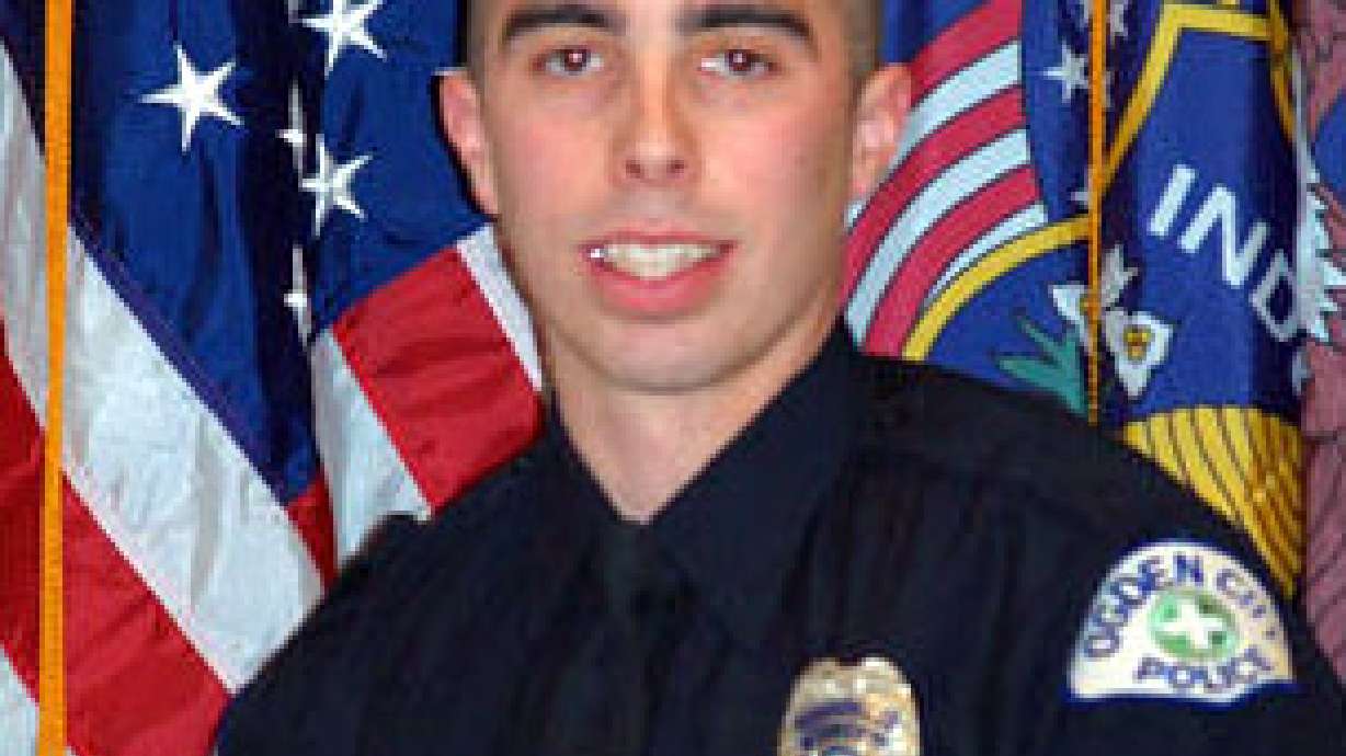 Injured officer's condition upgraded again