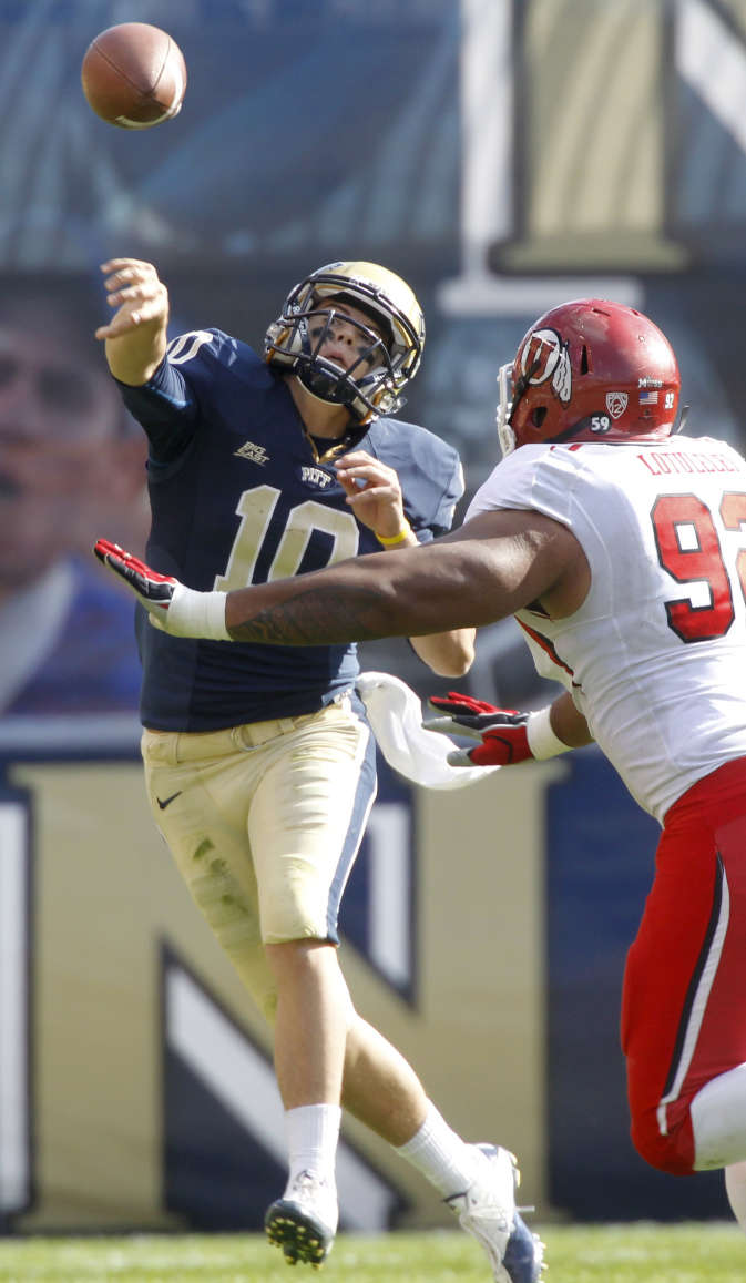 Pittsburgh quarterback Trey Anderson (10 )is pressured by Utah defensive tackle Star Lotulelei (92) and throws an incomplete pass during the fourth quarter of an NCAA college football game on Saturday, Oct. 15, 2011, in Pittsburgh. Utah won 26-14. (AP Photo/Keith Srakocic)