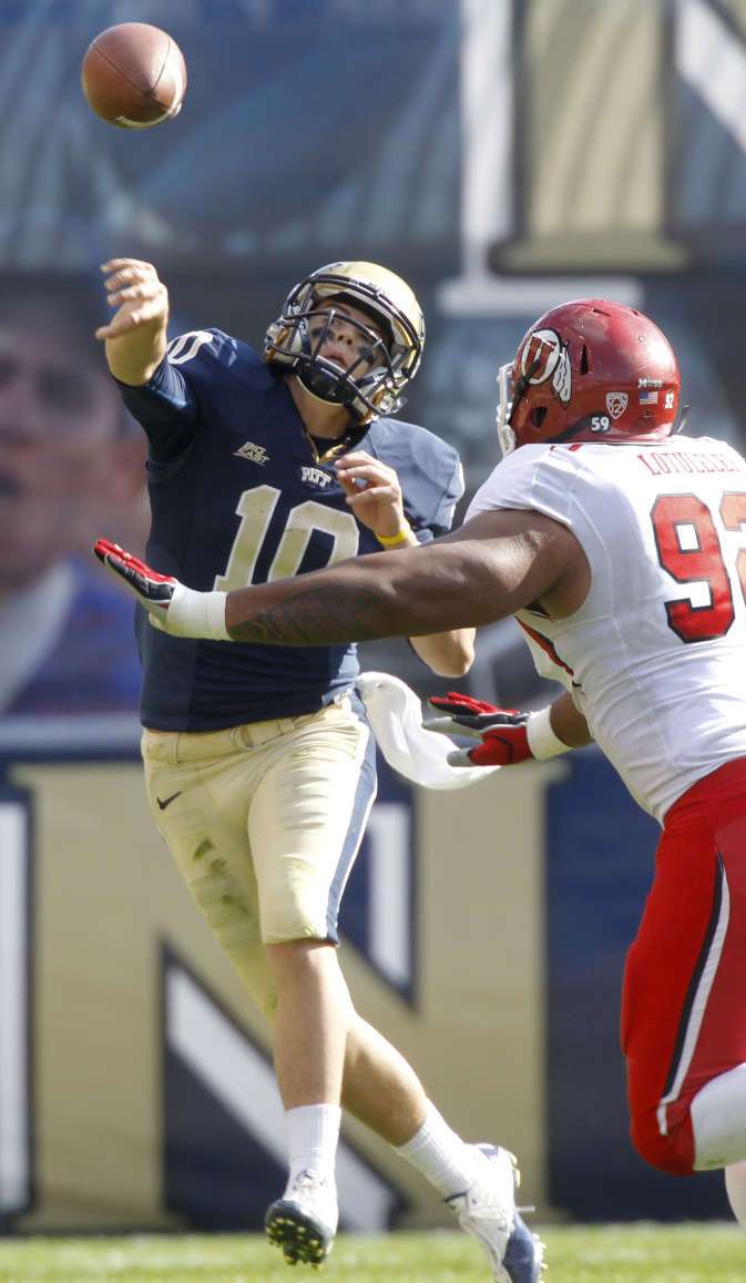 Pittsburgh quarterback Trey Anderson (10 )is pressured by Utah defensive tackle Star Lotulelei (92) and throws an incomplete pass during the fourth quarter of an NCAA college football game on Saturday, Oct. 15, 2011, in Pittsburgh. Utah won 26-14. (AP Photo/Keith Srakocic)