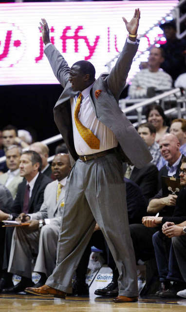 Jazz head coach Tyrone Corbin yells at one of 
the referees after a no call. (Deseret News)