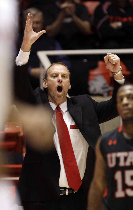 Utah Utes head coach Larry Krystkowiak shouts instruction during NCAA basket ball action in Salt Lake City Thursday, Jan. 5, 2012. The Utes won in overtime. (Jeffrey D. Allred, Deseret News)