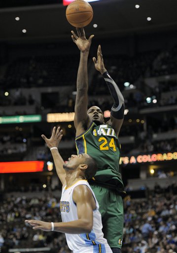 Utah Jazz forward Paul Millsap (24) shoots over 
Denver Nuggets guard Arron Afflalo (6). Utah 
beat Denver 106-96. (AP Photo/Jack Dempsey)