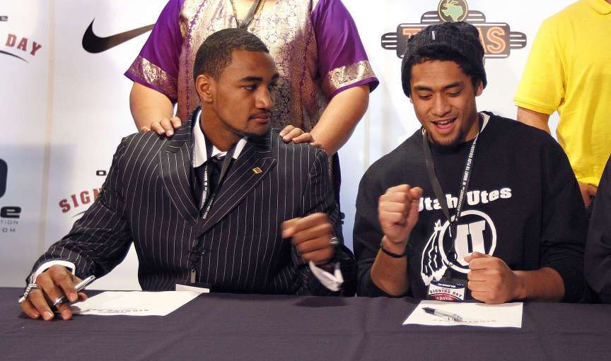University of Utah recruits Nate Fakahafua from Highland High , left, and Harvey Langi, from Bingham High, as athletes from around the state sign their Letters of Intent on a National Signing Day party in the Club Real Room at RIo Tinto Stadium Wednesday, Feb. 2, 2011, in Sandy, Utah. (Tom Smart, Deseret News)