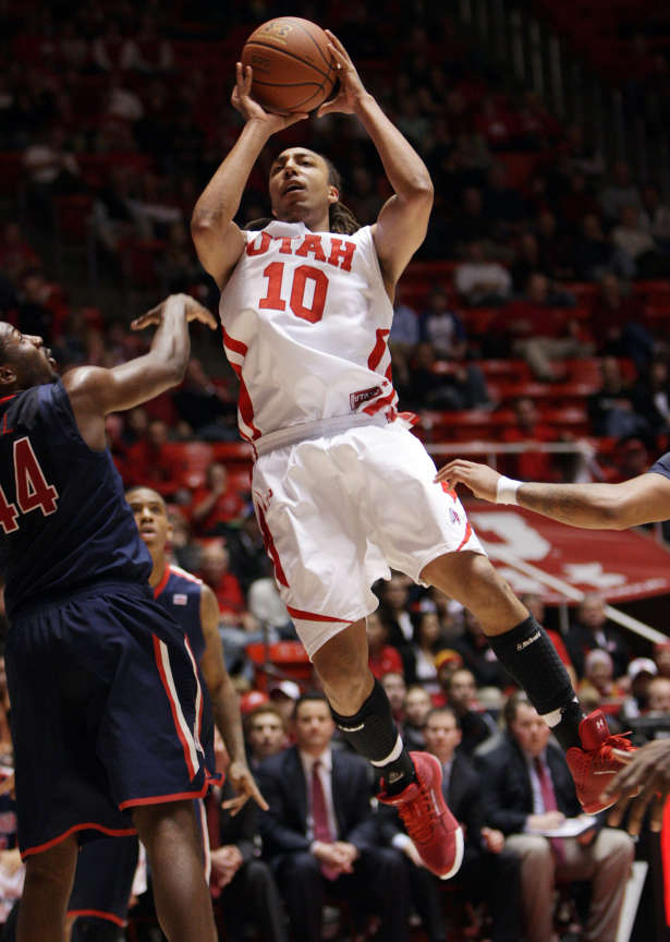 Utah Utes forward Dijon Farr (10) drives on Arizona Wildcats forward Solomon Hill (44) in Salt Lake City Thursday, Jan. 19, 2012. (Jeffrey D. Allred, Deseret News)