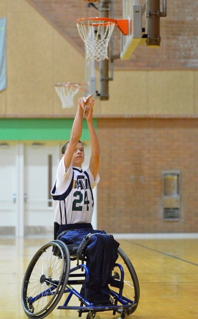 Junior Wheelin' Jazz player Spencer Heslop goes for a lay-up. (Photo: Ami Wilcox)