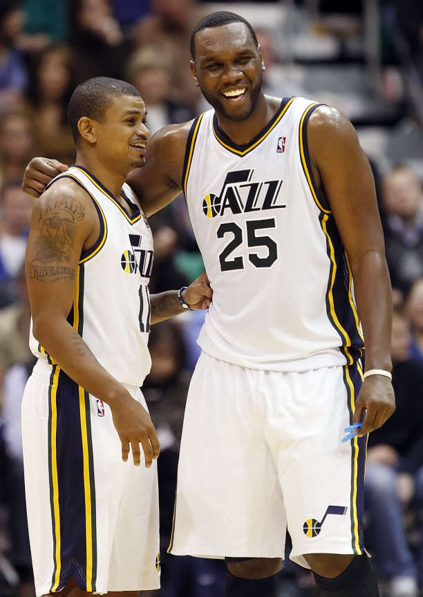Utah Jazz point guard Earl Watson (11) ,left, and Utah Jazz center Al Jefferson (25) laugh after a play as the Utah Jazz and the Milwaukee Bucks play Tuesday, Jan. 3, 2012 at Energy Solutions arena in Salt lake City. The Jazz won 85-73. (Scott G Winterton, Deseret News)