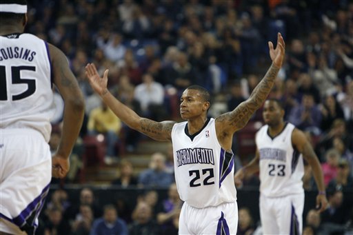 Sacramento Kings guard Isaiah Thomas (22) pumps 
up the crowd.(AP Photo/Steve Yeater)