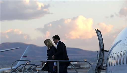 Republican presidential candidate, former Massachusetts Gov. Mitt Romney, arrives with his wife Ann for a campaign stop in Las Vegas, Wednesday, Feb. 1, 2012. (AP Photo/Gerald Herbert)