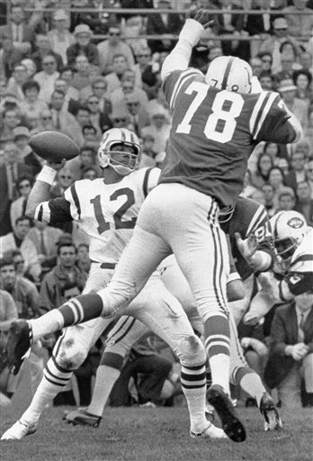 New York Jets Joe Namath (12) throws a pass
against the Baltimore Colts in Super Bowl III
in Miami. (AP Photo/File)