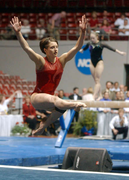 Theresa Kulikowski performs her floor exercise 
in 2002. (Michael Brandy/Deseret News)