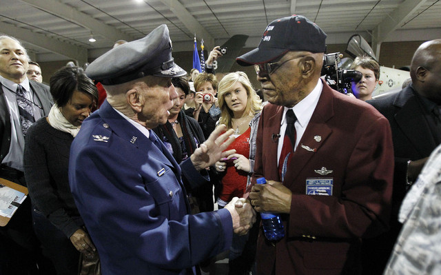 Retired Col. Jack Tueller, age 92, left, of the USAF, greets retired Air Force Lt. Col. James H. Harvey III, age 88, of the Tuskegee Airmen, at Hill Air Force Base, Thursday, Feb. 2, 2012. (Photo: Ravell Call, Deseret News)