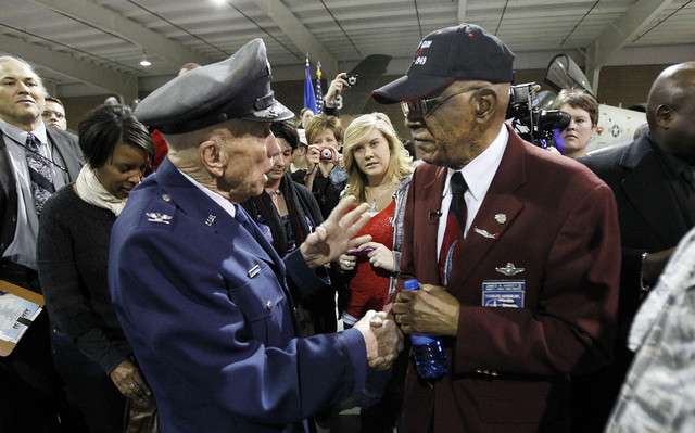 Retired Col. Jack Tueller, age 92, left, of the USAF, greets retired Air Force Lt. Col. James H. Harvey III, age 88, of the Tuskegee Airmen, at Hill Air Force Base, Thursday, Feb. 2, 2012. (Photo: Ravell Call, Deseret News)