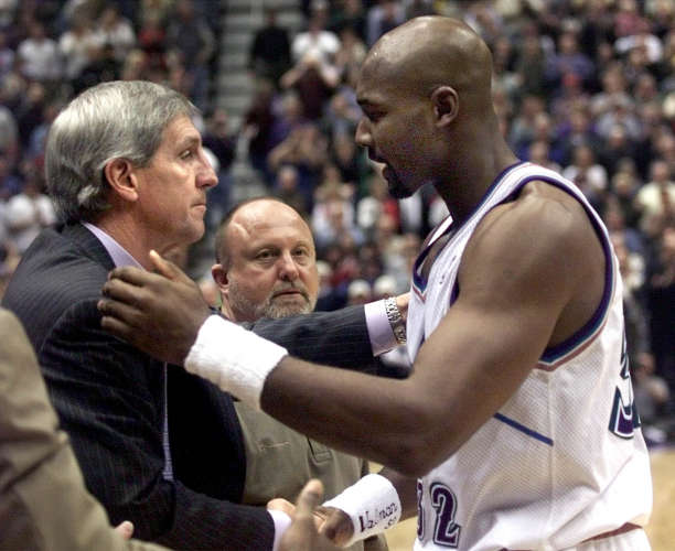 Karl Malone is congratulated by coach Jerry
Sloan after he scored his basket that broke
Wilt Chamberlain's record Dec. 5, 2000 against
the Toronto Raptors. (Chuck Wing, Deseret
News).