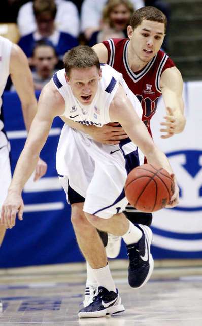 BYU's Brock Zylstra front is fouled by Loyola
Marymount's #34 Drew Viney after Zylstra stole
the ball. (Deseret News)