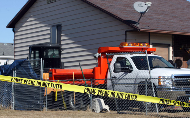 Police arrest owner of home where body found