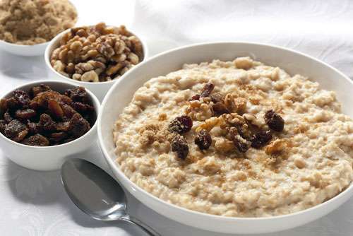 Quick oatmeal with fruit and nuts.