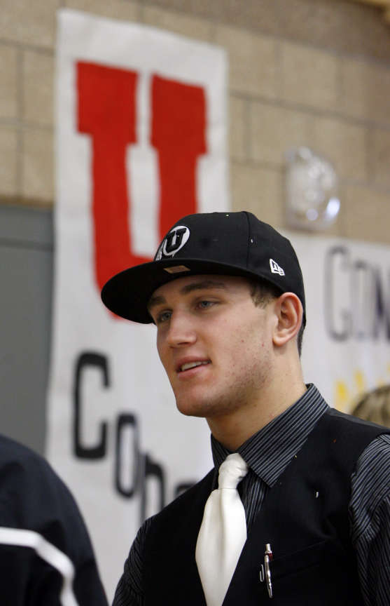 Chase Hansen chats with well-wishers after signing his letter of intent at Lone Peak High School on Wednesday, February 1, 2012. Hansen will be playing football at the University of Utah. (Laura Seitz, Deseret News)