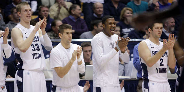 The BYU bench cheers the final baskets of the
game as the Cougars beat Gonzaga on Feb. 2.
(Deseret News)