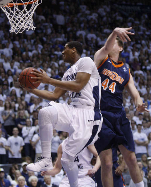 BYU's Brandon Davies shoots past Pepperdine's
Taylor Darby. (Deseret News)
