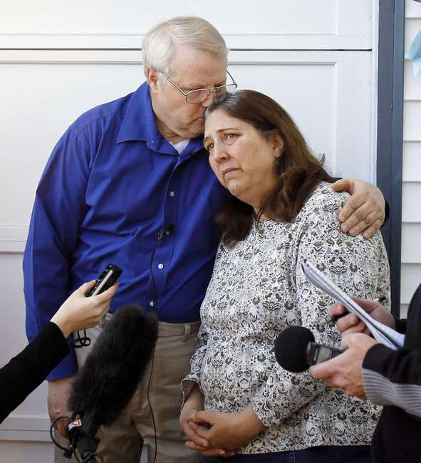 Chuck and Judy Cox hug at their home in Puyallup, Wash., Monday, Feb. 6, 2012. They want to explore solutions preventing incidents like the murder of their grandsons from occurring to others. (Photo: Ravell Call, Deseret News)