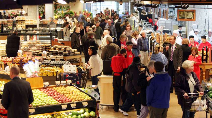 Grocery shoppers shop at the new City Creek Harmons store in downtown Salt Lake City.