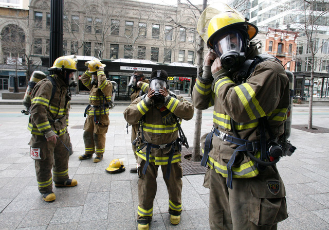 South Summit firefighters suit up to climb 598 stairs to the 23rd floor of the Wells Fargo Center during the seventh annual Fight for Air Climb in Salt Lake City on Feb. 25, 2012. A South Summit fire sergeant was severely injured while on duty Friday, July 2, 2021, authorities say.
