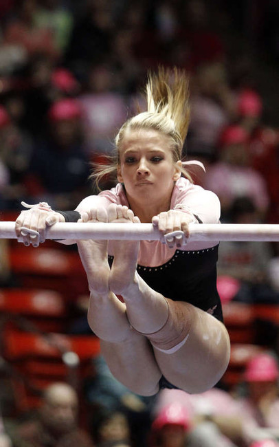 Hailee Hansen of Utah performs on the bars against Oregon State during their gymnastics meet at the Huntsman Center in Salt Lake City Friday, March 2, 2012. (Deseret News)