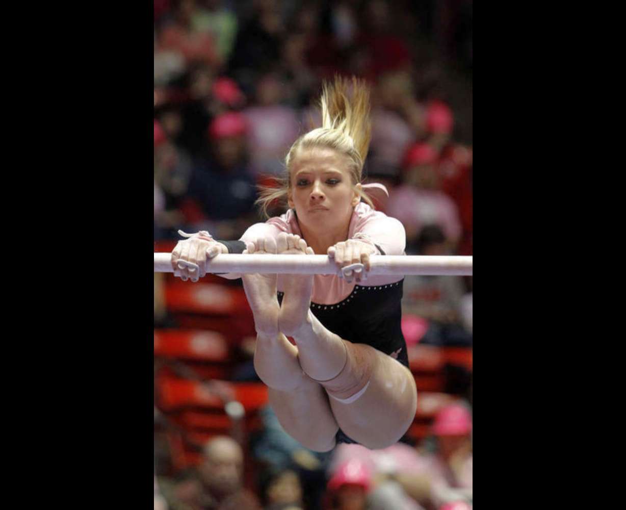 Hailee Hansen of Utah performs on the bars against Oregon State during their gymnastics meet at the Huntsman Center in Salt Lake City Friday, March 2, 2012. (Deseret News)