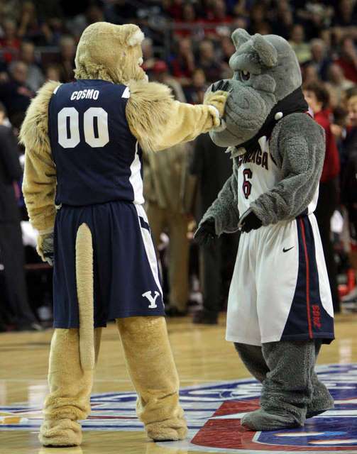 Cosmo messes around with the Gonzaga mascot in
the West Coast Conference Tournament (Jeffrey
Allred, Deseret News).