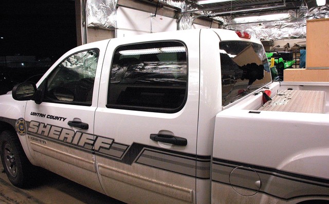 A Uintah County sheriff's vehicle is riddled with bullet holes after a late night shooting in Vernal, Thursday, March 8, 2012. (Photo: Uintah County Sheriff's Office)