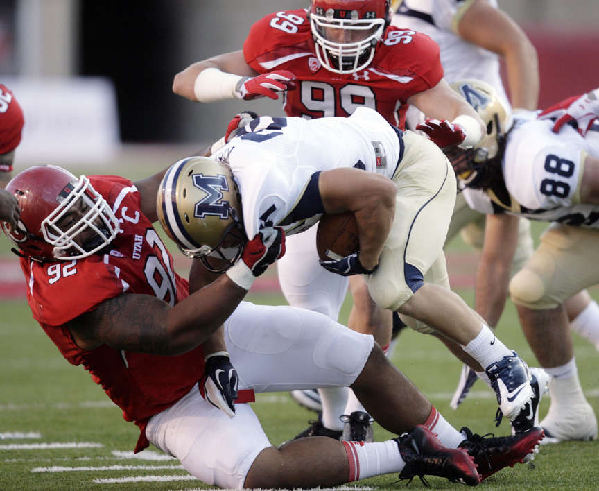 Utah Utes defensive tackle Star Lotulelei (92) pulls down Montana State Bobcats running back Cody Kirk (25) during the Utes' season-opener at Rice Eccles Stadium (Jeffrey D. Allred, Deseret News)