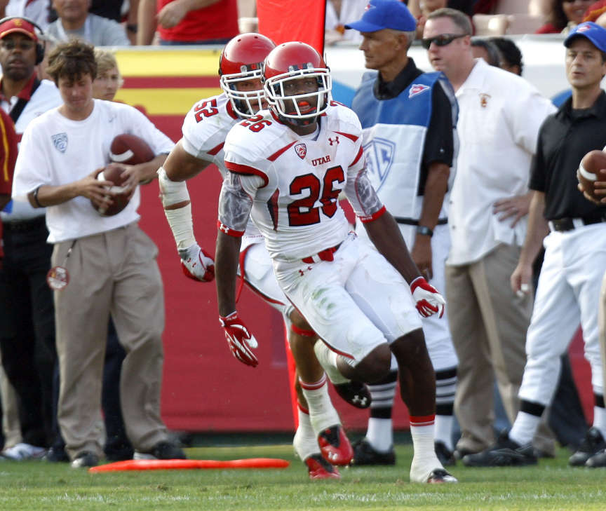 Utah Utes defensive back Ryan Lacy (26) celebrates an interception as Utah plays USC (Tom Smart, Deseret News)